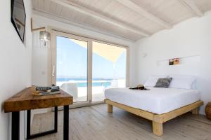 Posteľ alebo postele v izbe v ubytovaní Apartments enosis, Triton