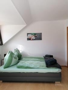 Ένα ή περισσότερα κρεβάτια σε δωμάτιο στο Ferienwohnung Familie Pichler