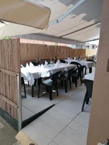 A restaurant or other place to eat at Hotel Eden