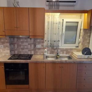 Kuchyňa alebo kuchynka v ubytovaní Klaidis house