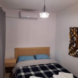 Posteľ alebo postele v izbe v ubytovaní Klaidis house