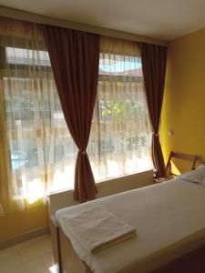 Lova arba lovos apgyvendinimo įstaigoje Guest House Ohrid Trpeski