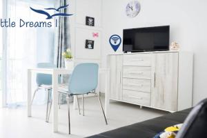 Televízia a/alebo spoločenská miestnosť v ubytovaní B-Rent San Valentin Little Dreams Sea View