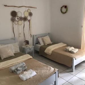 Postel nebo postele na pokoji v ubytování Athina Studios