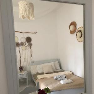 Postel nebo postele na pokoji v ubytování Athina Studios