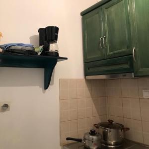 Kuchyň nebo kuchyňský kout v ubytování Athina Studios