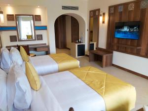 Tempat tidur dalam kamar di Lazuli Hotel, Marsa Alam