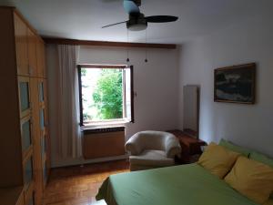 Łóżko lub łóżka w pokoju w obiekcie Vuksanovic Apartment