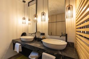 Koupelna v ubytování Hotel Bei Gretel, Wellness & Ayurveda + 37 fotografií