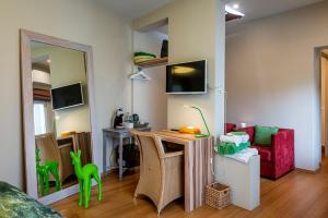 TV a/nebo společenská místnost v ubytování Adamas B&B