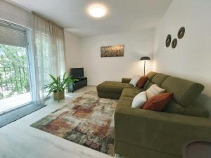 Posezení v ubytování Green City Point Apartment