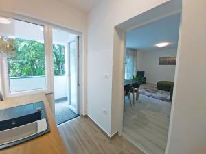 Posezení v ubytování Green City Point Apartment