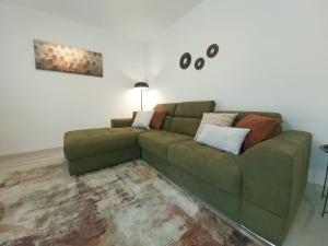 Posezení v ubytování Green City Point Apartment