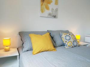 Postel nebo postele na pokoji v ubytování Green City Point Apartment