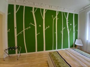 Ein Bett oder Betten in einem Zimmer der Unterkunft Ferienwohnung Xenia