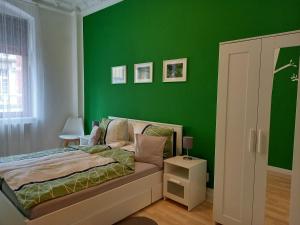 Postel nebo postele na pokoji v ubytování Ferienwohnung Xenia