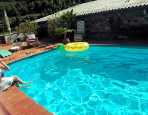 Bazén v ubytování Chalet "Rec dels Noguers" nebo v jeho okolí