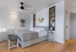Posteľ alebo postele v izbe v ubytovaní ONOS RESIDENCE