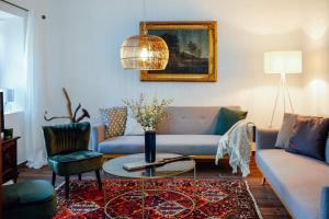 Posedenie v ubytovaní Apartment Aussee- Beletage Salzherrenhof- Küche, WLAN, Netflix