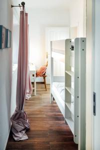 Posteľ alebo postele v izbe v ubytovaní Apartment Aussee- Beletage Salzherrenhof- Küche, WLAN, Netflix
