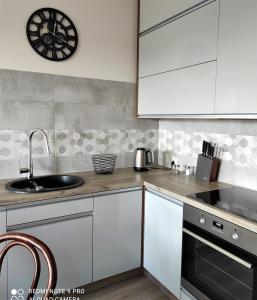 Kuchyňa alebo kuchynka v ubytovaní VIEW 20 APARTAMENT