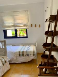 Кровать или кровати в номере Meloneras ideal