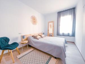 Posteľ alebo postele v izbe v ubytovaní Apartamento a 1 minuto de la playa