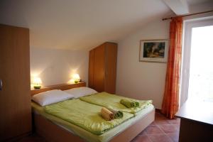 Postelja oz. postelje v sobi nastanitve (4855-2) Apartment in Lopar with sea view, balcony, air conditioning, WiFi