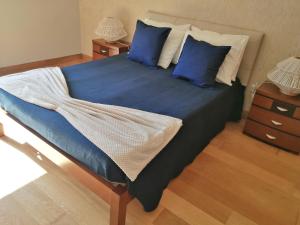 Un pat sau paturi într-o cameră la Gerês - Caniçada
