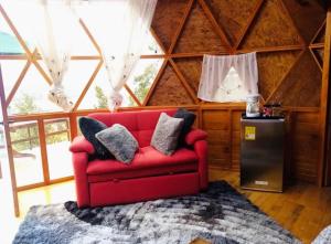 Ein Sitzbereich in der Unterkunft Glamping sede campestre Mirador de Pueblo Viejo