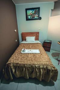 Posteľ alebo postele v izbe v ubytovaní Hostal Spring