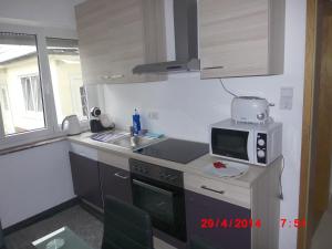 Afbeelding uit fotogalerij van Frankfurt Airport & Fair Apartment in Kelsterbach +15 foto's