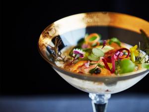 a bowl of food sitting on top of a wine glass at SETOUCHI RETREAT by Onko Chishin in Matsuyama