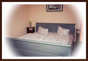 Ein Bett oder Betten in einem Zimmer der Unterkunft Kartoffelkate