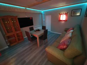 A television and/or entertainment centre at Casa Dana