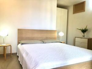 Postel nebo postele na pokoji v ubytování Casa Sant'Antoni