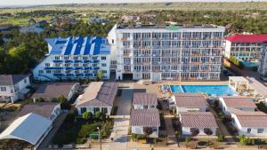 an aerial view of a resort with a pool at Berizka Park Hotel in Koblevo