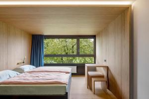 Letto o letti in una camera di Rapperswil-Jona Youth Hostel