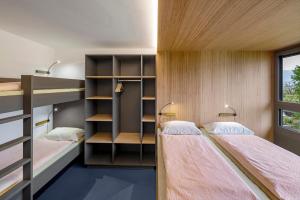 Letto o letti in una camera di Rapperswil-Jona Youth Hostel