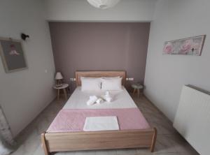 Ένα ή περισσότερα κρεβάτια σε δωμάτιο στο Sun Day Villa