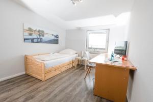 Postel nebo postele na pokoji v ubytování Zum Alten Fährhaus - Bed & Breakfast