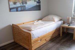 Postel nebo postele na pokoji v ubytování Zum Alten Fährhaus - Bed & Breakfast
