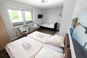 Postel nebo postele na pokoji v ubytování Zum Alten Fährhaus - Bed & Breakfast