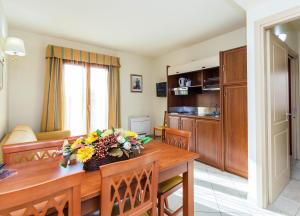 Kuchyň nebo kuchyňský kout v ubytování Hotel Regina Elena