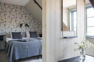 Postel nebo postele na pokoji v ubytování Gumbalde Resort