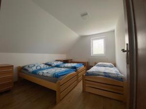 Postel nebo postele na pokoji v ubytování Chata Slanica