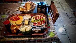a table with a tray of food on a table at Agroturystyka u Willima in Mechnica