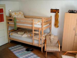 a bedroom with two bunk beds in a room at Farmer's Room at Sedliacky Dvor - Brezno in Brezno