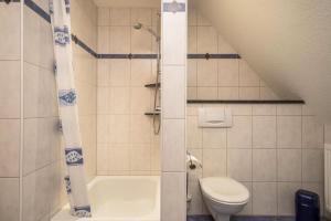 Koupelna v ubytování Ferienwohnung Henne + 17 fotografií