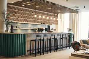 Reštaurácia alebo iné gastronomické zariadenie v ubytovaní Ullrhaus